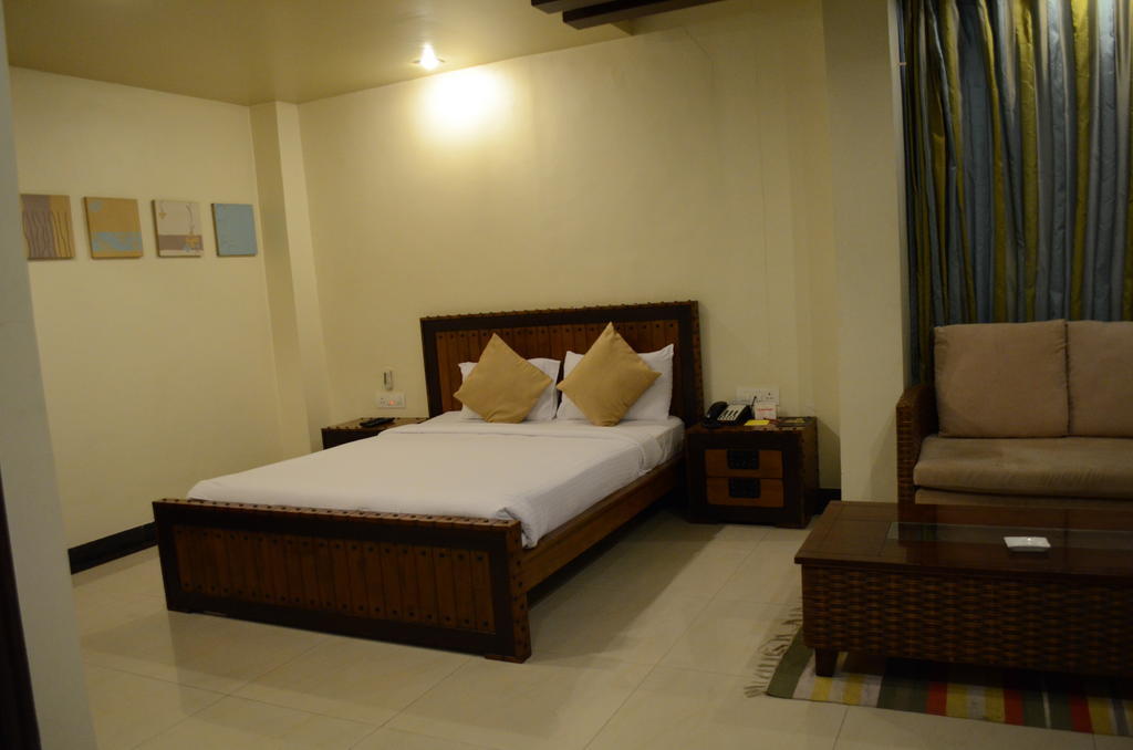 Hotel The Elite Suites Pune Phòng bức ảnh
